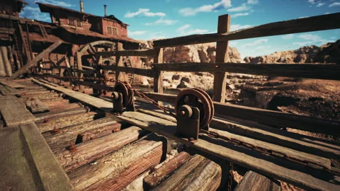 Rustic mining equipment on wooden structure in a remote canyon landscape Stock Footage 310450892