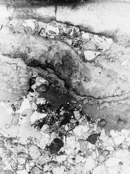 Rustic mixed terrazzo concrete floor crack texture Foto stock