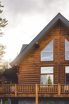 Rustic mountain log cabin Stock Photos