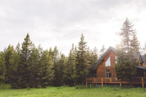 Rustic mountain log cabin Stock Photos