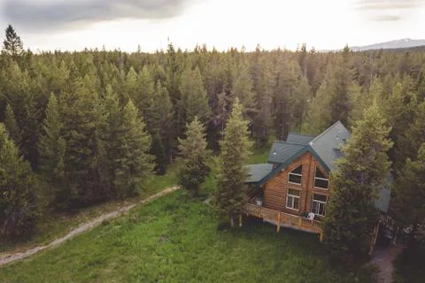 Rustic mountain log cabin Stock Photos