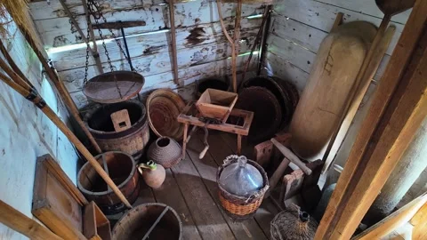 Rustic museum interior showing Hungarian folk artifacts and rural tools Stock Footage 336505537