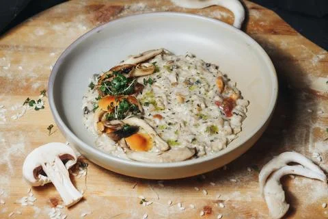 Rustic Mushroom Risotto on Wooden Cutting Board Stock Photos