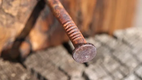Rustic nail in old wood c/u Stock Footage 108458178