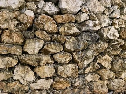 Rustic natural stone wall background. Stock-Fotos