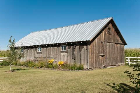 A rustic old farm shed. Stock Photos