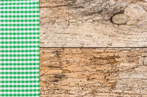 Rustic old wood table background with green napkin Stock Photos