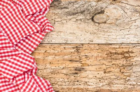 Rustic old wooden table background with red tablecloth Stock Photos