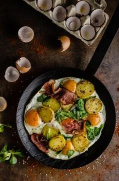 Rustic omelette fried eggs Stock Photos
