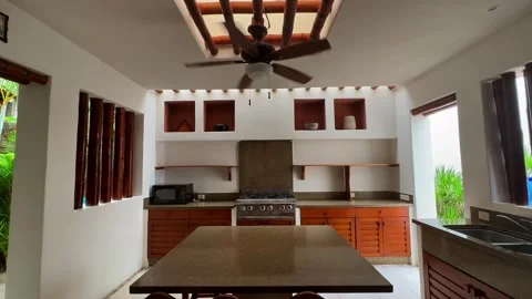 Rustic open kitchen interior typical of a holiday villa Stockbeeldmateriaal 331162841