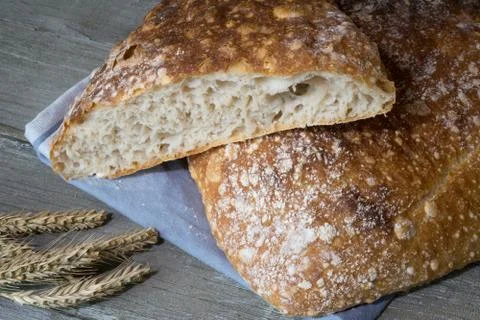 Rustic organic Nordic bread with large holes Stock Photos
