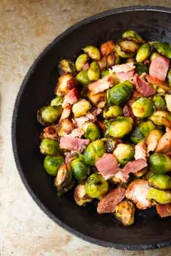 Rustic pan roasted brussels sprouts with bacon Stock Photos