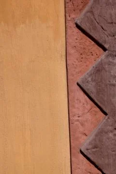 Rustic pattern in plaster on painted wall Stock Photos