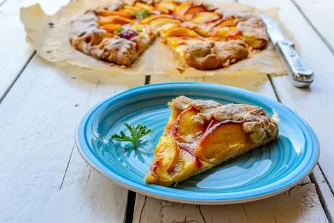 Rustic peach pie Stock Photos