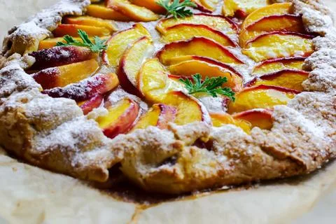 Rustic peach pie Stock Photos