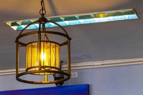 Rustic Pendant Lamp Hanging From Ceiling In Thai Hotel Interior Thailand. Stock Photos