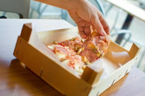 Rustic pizza by the slice (square pizza) Stock Photos