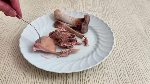 Rustic Pork Scraps and Bones on Plate, Casual Kitchen Mood Video stock 320768434