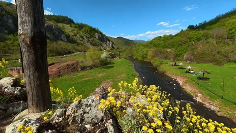 Rustic post frames the valley view. Balkan, Eastern Europe, POV Video stock 333590408