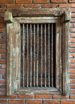 Rustic prison window with rust brick Stock Photos