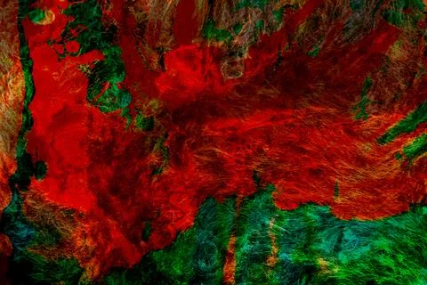 Rustic red and green abstract featuring layered circular lines and dense Stock Photos