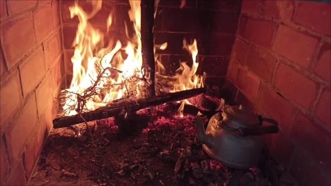 Rustic Red Brick Fireplace with Roaring Fire Stock Footage 334345109