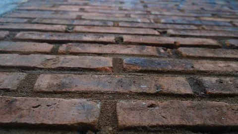 Rustic Red Brick Wall Background with Selective Focus and Texture Pattern Stock Photos