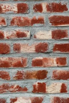 Rustic Red Brick Wall with Grey Mortar Texture Stock Photos