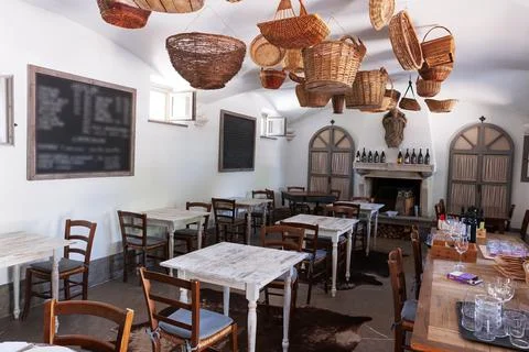 Rustic restaurant interior with fireplace Stock Photos