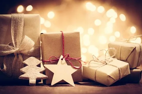 Rustic retro gifts, present boxes on glitter background. Christmas time Stock Photos