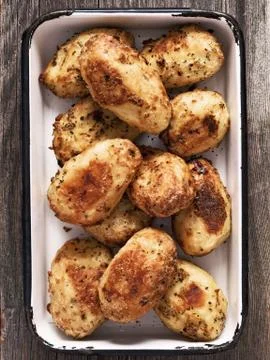 Rustic roasted baked potato Stock Photos
