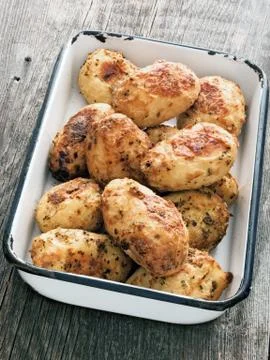 Rustic roasted baked potato Stock Photos