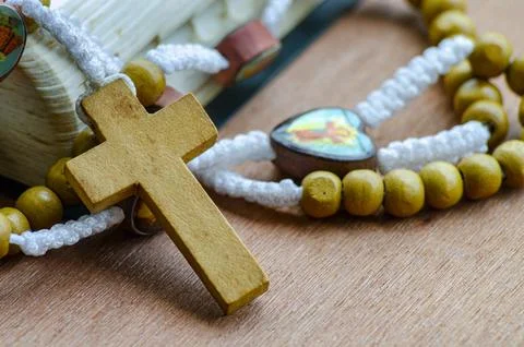 Rustic Rosary With Cross in Horizontal Frame with customizable space for text Foto stock