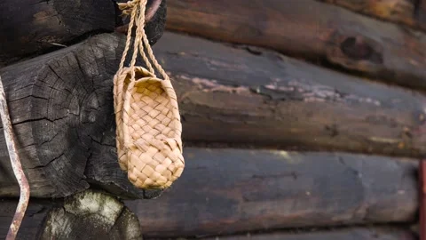 Rustic rural concept. Antique handmade rustic shoes - bast shoes. A pair of b Stock Footage 166488067