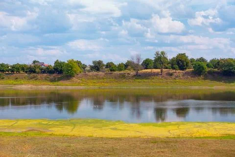 Rustic scenery with pond Stock Photos