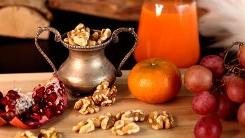 Rustic setup of walnuts, fresh fruits, orange juice, showcasing nutritious Stock Photos
