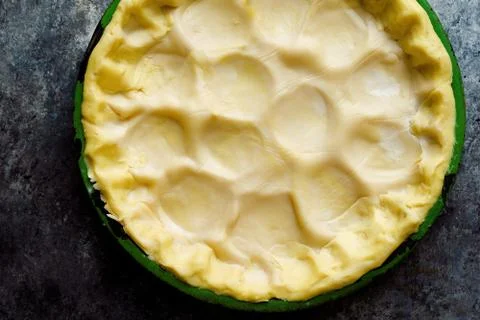 Rustic shortcrust pie pastry in baking pan Stock Photos