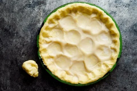 Rustic shortcrust pie pastry in baking pan Stock Photos