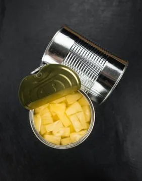 Rustic slate slab with Chopped Pineapple (preserved), selective focus Stock Photos