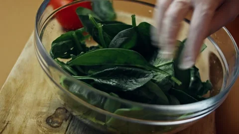 Rustic smooth green spinach purée shown in macro detail in kitchen, 4K Stock Footage 341110220
