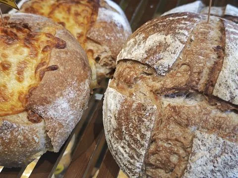 Rustic Sourdough Bread Loaves with Crusty Artisan Texture and Golden Crust Stock Photos