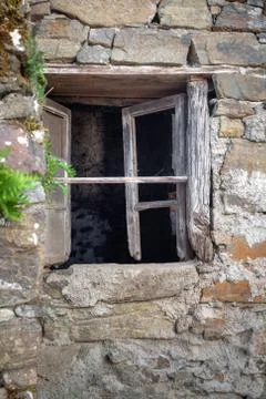 Rustic Spanish Country House Window in Stone Wall Stock Photos