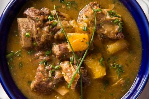 Rustic Stew meat with manioc called Vaca atolada in Brazil. Stock Photos