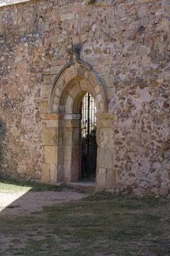 A rustic stone archway at Monasterio de San Juan de Duero in Soria, Spain. .. Stock Photos