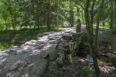 Rustic Stone Bridge in the Finnish Forest of Rascafra Stock Photos