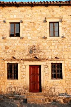 Rustic Stone Building Facade at Golden Hour Stock Photos