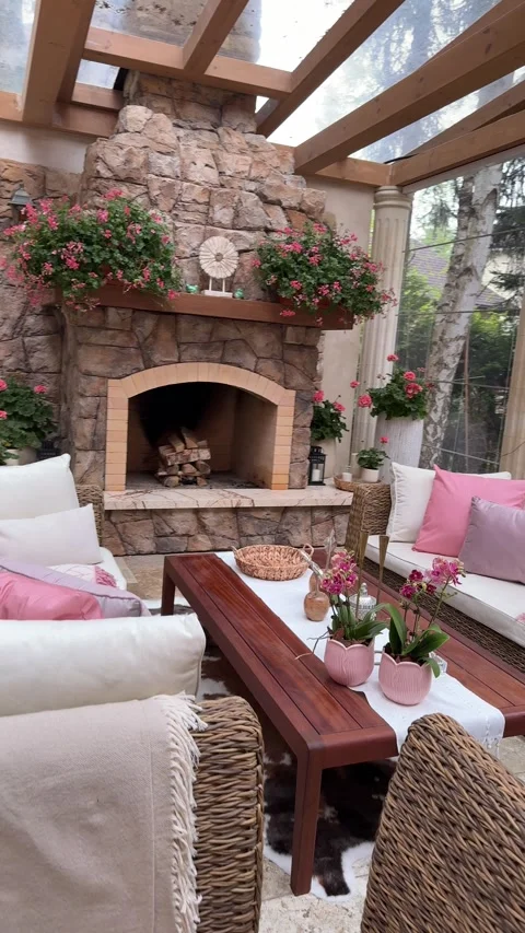 Rustic Stone Fireplace in Luxury Outdoor Gazebo With Floral Decor Video stock 334886352