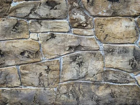 Rustic stone handcrafted wall background Stock Photos