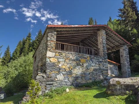 Rustic Stone House in Nature Stock Photos