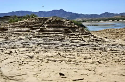 Rustic stone from the Orange River formed by the flood Stock Photos